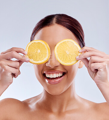 Buy stock photo Skincare, mockup or happy girl with orange as natural facial with citrus or vitamin c for wellness. Studio background, smile or healthy female model smiling with organic fruits for dermatology beauty