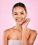 Happy woman, face and portrait smile for cream, skincare or beauty moisturizer against a pink studio background. Female person or model smiling for lotion, cosmetic creme products or facial treatment