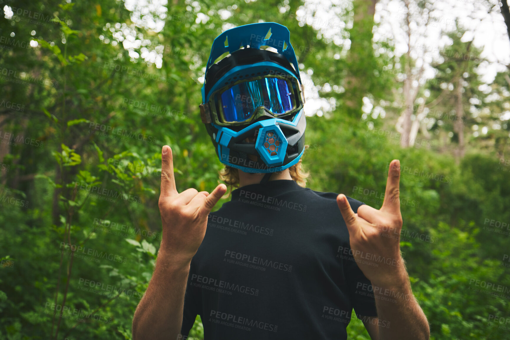 Buy stock photo Rocker, man and biker with helmet, horn sign and fun attitude for cycling adventure in forest. Portrait of cyclist with rock on hand gesture, emoji and freedom for sports action in mountains outdoor