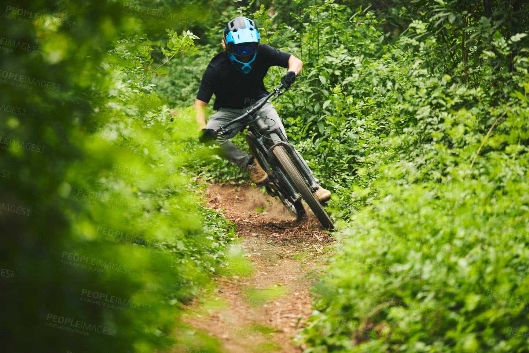 Buy stock photo Mountain bike, man and cycling in forest for adventure, freedom and power of off road challenge on path. Athlete, sports and bicycle for action, competition and cardio racing for adrenaline in nature