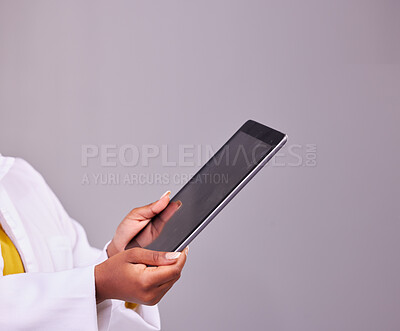 Buy stock photo Connection, showing and hands with a tablet for communication isolated on a studio background. Digital, internet and a woman with technology for social media, reading information or chat on backdrop