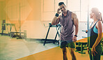 Man, woman and talking about fitness at gym while happy or shy for conversation about health and wellness. Athlete people or team together at club for training workout or exercise with mockup overlay