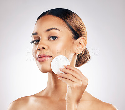Buy stock photo Skincare, cotton pad and woman portrait in studio for cleaning, wellness or makeup removal on grey background. Facial, swab and face of lady model with toner, cleanser or hydration cosmetic treatment
