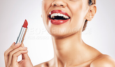 Buy stock photo Happy woman, lips and red lipstick with makeup and beauty, cosmetic product and glow isolated on studio background. Female model apply cosmetics, mouth and cosmetology with skin, shine and glamour