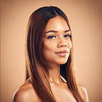 Beauty, hair and portrait of woman for wellness, keratin treatment and haircare aesthetic in studio. Salon, hairdresser and face of female person on orange background for growth, shine and texture