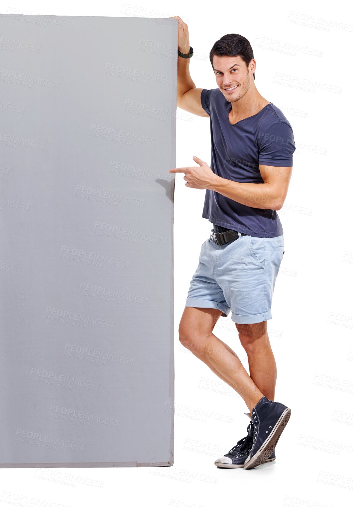 Buy stock photo Portrait, fashion and a man pointing to mockup while isolated next to a transparent background for branding. PNG, style and mock up space with a happy male person standing showing gray wall space