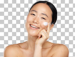 Face, skincare and beauty with a model asian woman applying lotion or moisturizer to her skin in studio. Cosmetics, antiaging and wellness with a young female inside to promote a skin product isolated on a png background