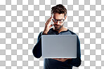 PNG of Studio shot of a handsome young man using a laptop and looking stressed