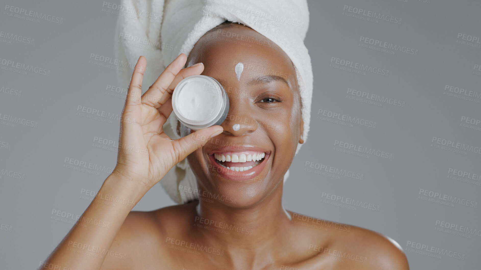 Buy stock photo Black woman, portrait and beauty with skincare, cream for face with natural cosmetics on grey background. Lotion, dermatology and African model with smile, moisturizer and treatment in studio