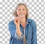 One happy mature caucasian woman playing with a sparkler on her birthday while posing in the studio. Smiling white lady showing joy and happiness while celebrating isolated on a png background