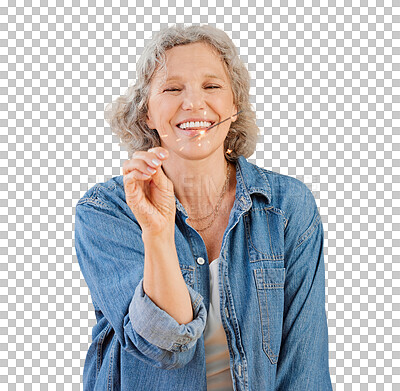 Buy stock photo One happy mature caucasian woman playing with a sparkler on her birthday while posing in the studio. Smiling white lady showing joy and happiness while celebrating isolated on a png background
