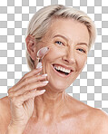 Studio Portrait of a mature woman woman using a rose quartz derma roller for skin cell renewal. Happy older woman using anti ageing tool against purple copyspace background