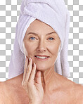 Portrait of a mature caucasian woman wearing a towel on her head after enjoying a refreshing shower. Older model using hair a deep conditioner treatment while posing against a grey copyspace background