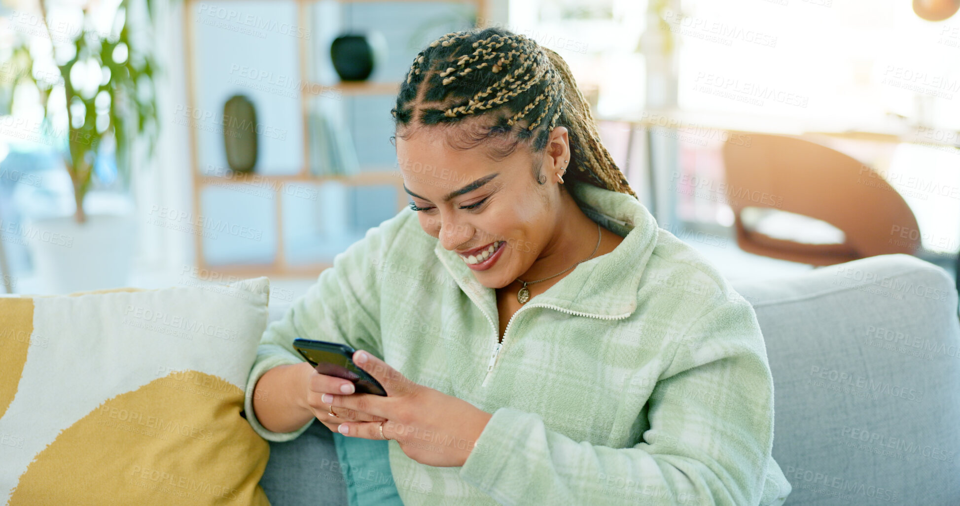 Buy stock photo Home, smile and woman with a cellphone, internet and connection with social media, typing and network. Person, apartment and girl with a smartphone, mobile user and contact with digital app and relax