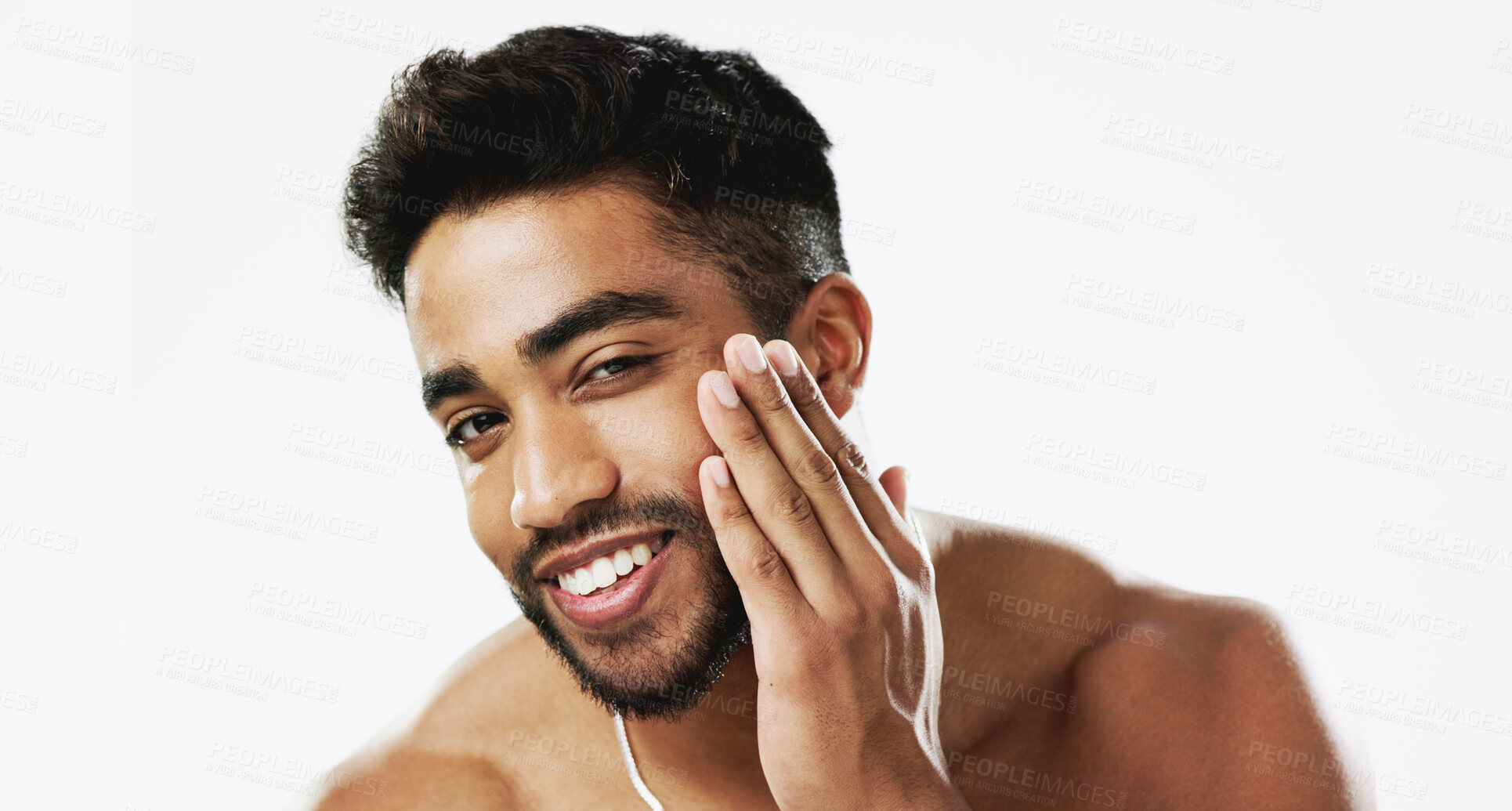 Buy stock photo Face, skin and man with smile, beauty and grooming with wellness and dermatology on white background. Skincare, shaving and hygiene, cosmetic care and portrait with happy Indian model in studio 