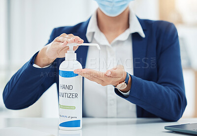 Buy stock photo Compliance, hygiene and covid regulations with hand sanitizer and business woman in a corporate, office. Employee cleaning hands before shift, disinfecting desk and workspace while social distancing