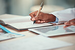 Hands of a doctor planning in a notebook and using a tablet. Closeup of a doctor writing in a diary. Medical gp writing ideas in a journal. Medical doctor browsing an app online on a wireless tablet