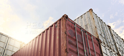 Buy stock photo Cargo container, logistics and shipping of import and export goods at storage in shipyard for global supply chain. Distribution, supply chain and industrial port against sky at international harbor