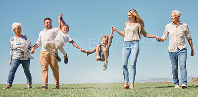 Buy stock photo Lift, happy family and summer walk in a field, play and fun in nature together, smile and laugh. Parents, kids and grandparents love enjoying conversation or family time, smile and hold hands outdoor
