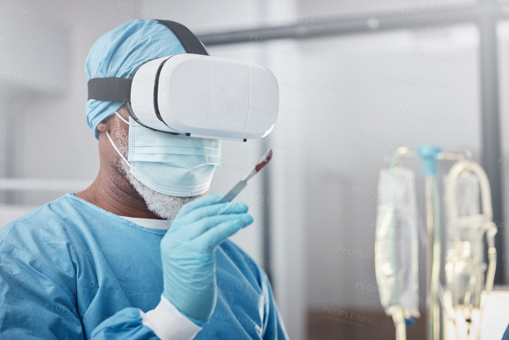 Buy stock photo Virtual reality, medical and doctor with a surgery simulation in operation room in the hospital. Vr, healthcare and male surgeon practicing and analyzing the human anatomy with futuristic device.