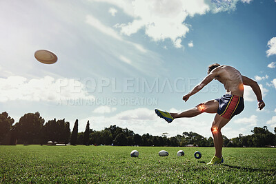 Buy stock photo Man, field and kick rugby ball for sport with red glow, knee and injury on grass with pain for fitness. Athlete guy, overlay for joint pain, power and workout for contest, competition and development