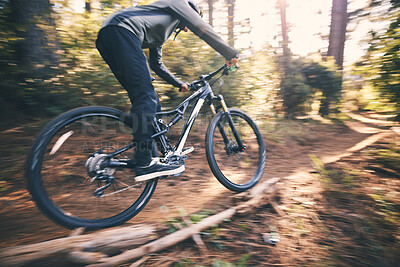 Buy stock photo Cycling, speed and man on a bicycle on a dirt forest road doing training and exercise on a bike. Fast, outdoor trail and athlete with energy on a nature adventure or fitness on a path
