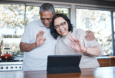 Buy stock photo Technology, mature couple with tablet and video call in kitchen of their home for connectivity. Social networking or online communication, retirement house or happiness and senior people wave hello