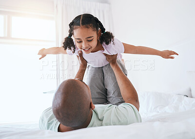 Buy stock photo Airplane, game and father with daughter in bedroom for morning, wake up and weekend. Happy, excited and funny with man and young girl playing in family home for happiness, freedom and support