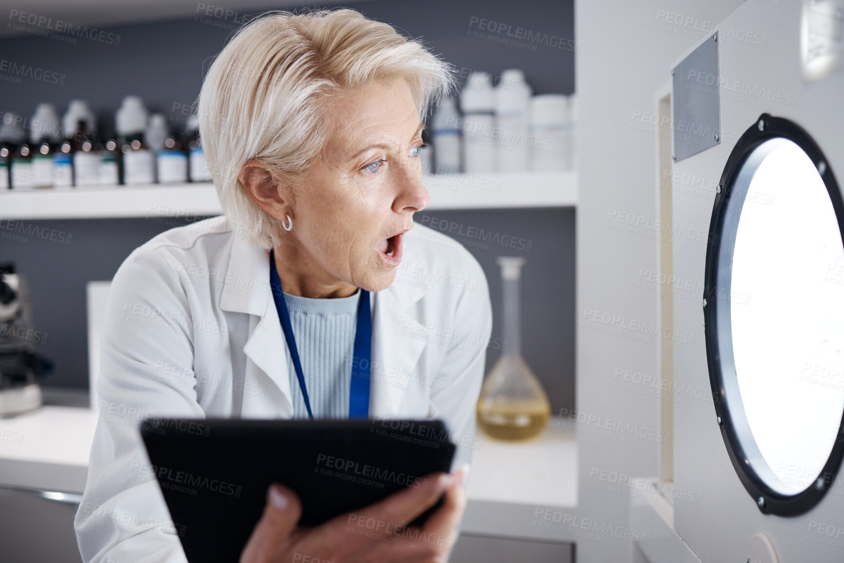 Buy stock photo Scientist, tablet and surprised woman with incubator for research, study analysis or test in laboratory. Technology, medical professional or senior science doctor shocked, wow and machine for biology