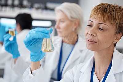 Buy stock photo Essential oil, development and scientist in a lab doing research organic and natural fragrance in a clinic. Serum, treatment and collagen expert working on a skincare, perfume or beauty product