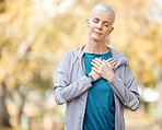 Fitness, heart attack and senior woman on a run for race, marathon or sports training in a park. Nature, health and elderly female person with a chest condition while doing cardio workout or exercise