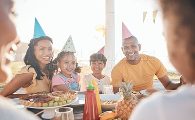 Buy stock photo Mother, father and children for birthday in park for event, celebration and party hat outdoors together. Family, social gathering and happy parents with kids at picnic with cake, presents and food