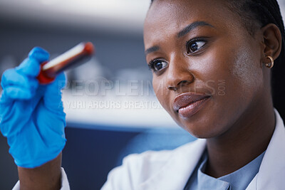 Buy stock photo Science, blood vial and female scientist in a lab working on a medical experiment, test or exam. Biotechnology, pharmaceutical and African woman researcher doing scientific research in a laboratory.