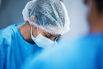 Buy stock photo Hospital, surgery and team of doctors in theatre for medical support, teamwork or healthcare solution in face mask. Focus of nurses and surgeon in blue scrubs in operating room, emergency and helping