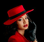 Woman, retro spy and glamour portrait in studio with vintage fashion and cosplay agent. Young female person, black background and luxury style with cosmetics, 1920s clothes and model with confidence