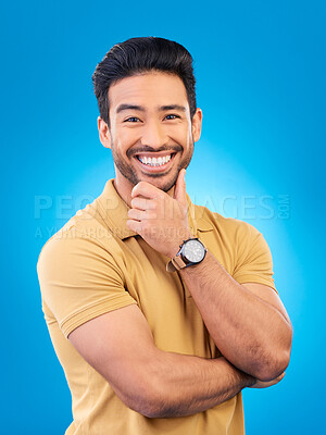 Buy stock photo Happy, man and smile portrait in studio with Asian model with confidence and headshot. Blue background, male person and casual fashion with handsome and friendly guy with modern style and outfit