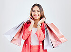 Fashion, portrait or happy woman with shopping bags for retail sale, product offer or discount deal. Choice, customer or girl shopper holding gift, present or product on promotion on white background