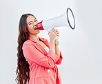 Portrait, megaphone or woman shouting an announcement, speech or review on studio background. Face, attention or voice of girl with news or broadcast of opinion on mockup space talking on mic speaker