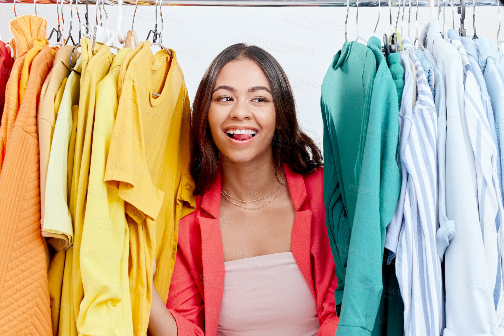 Buy stock photo Fashion, choice and clothes with woman in studio for decision, shopping and wardrobe. Boutique, retail and store with face of female customer on white background for search, creative and sale