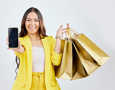 Buy stock photo Phone, portrait or happy woman with shopping bags on mockup space for a sale, offer or discount code. Online, mobile app or excited girl customer with gift or present on promotion on white background