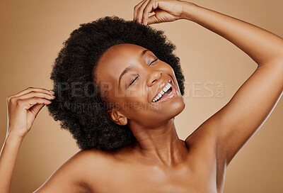 Buy stock photo Hair care, beauty and black woman with luxury, smile and wellness against a brown studio background. Female person, model and girl with happiness, dermatology and cosmetics with grooming and shampoo
