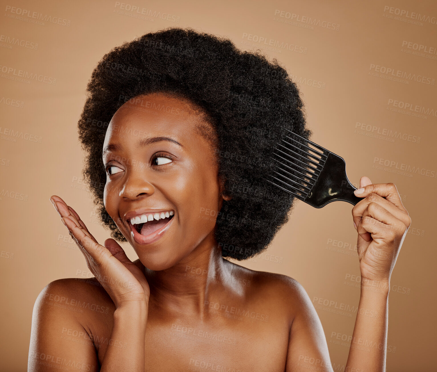 Buy stock photo Hair, comb and a happy model black woman in studio on a brown background for beauty or cosmetics. Aesthetic, afro and haircare with an attractive young female person looking excited for natural care