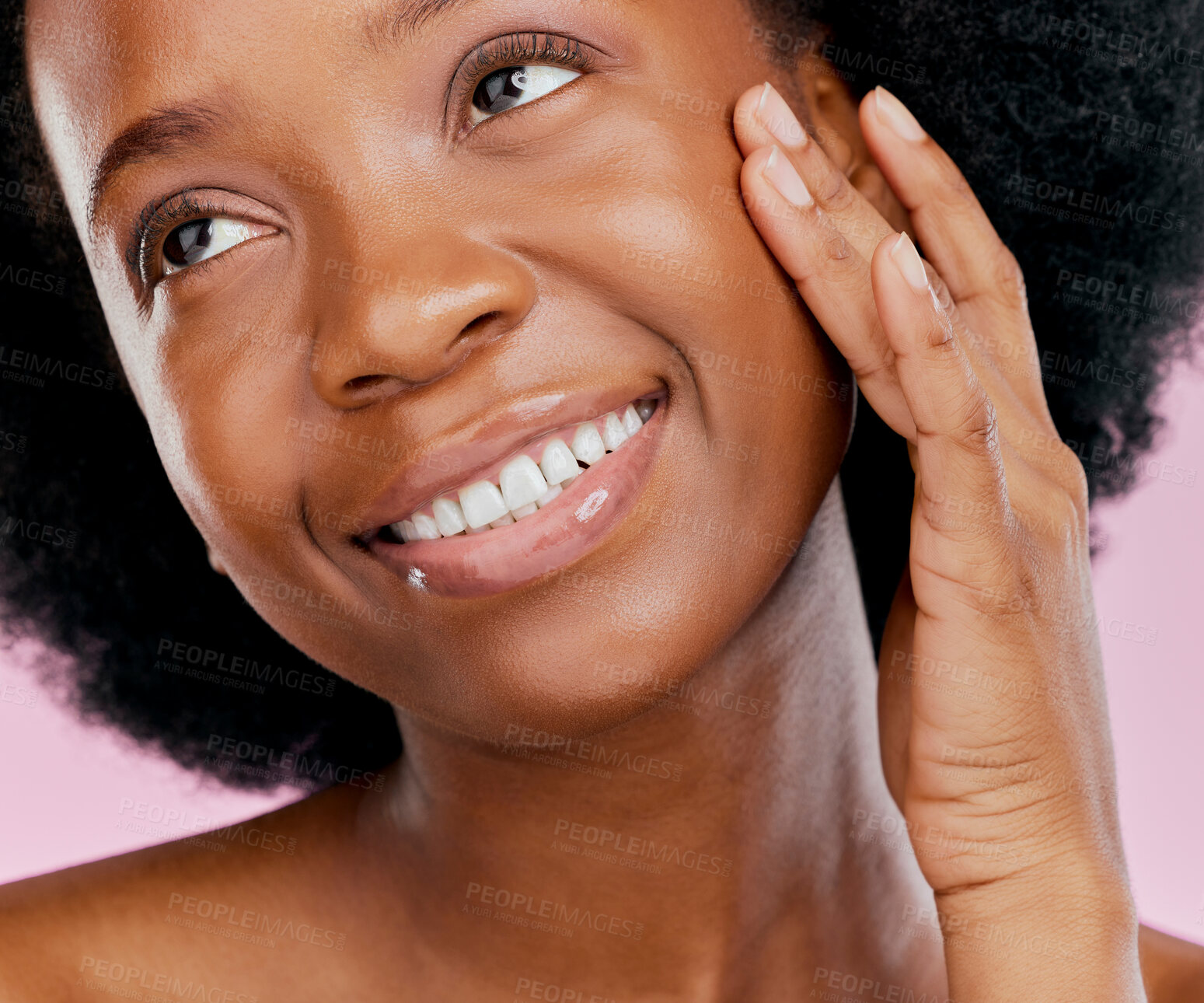 Buy stock photo Black woman with smile, natural beauty and skincare with cosmetics and hand touching face on pink background. African female model, glow and skin, happy and dermatology with facial in studio