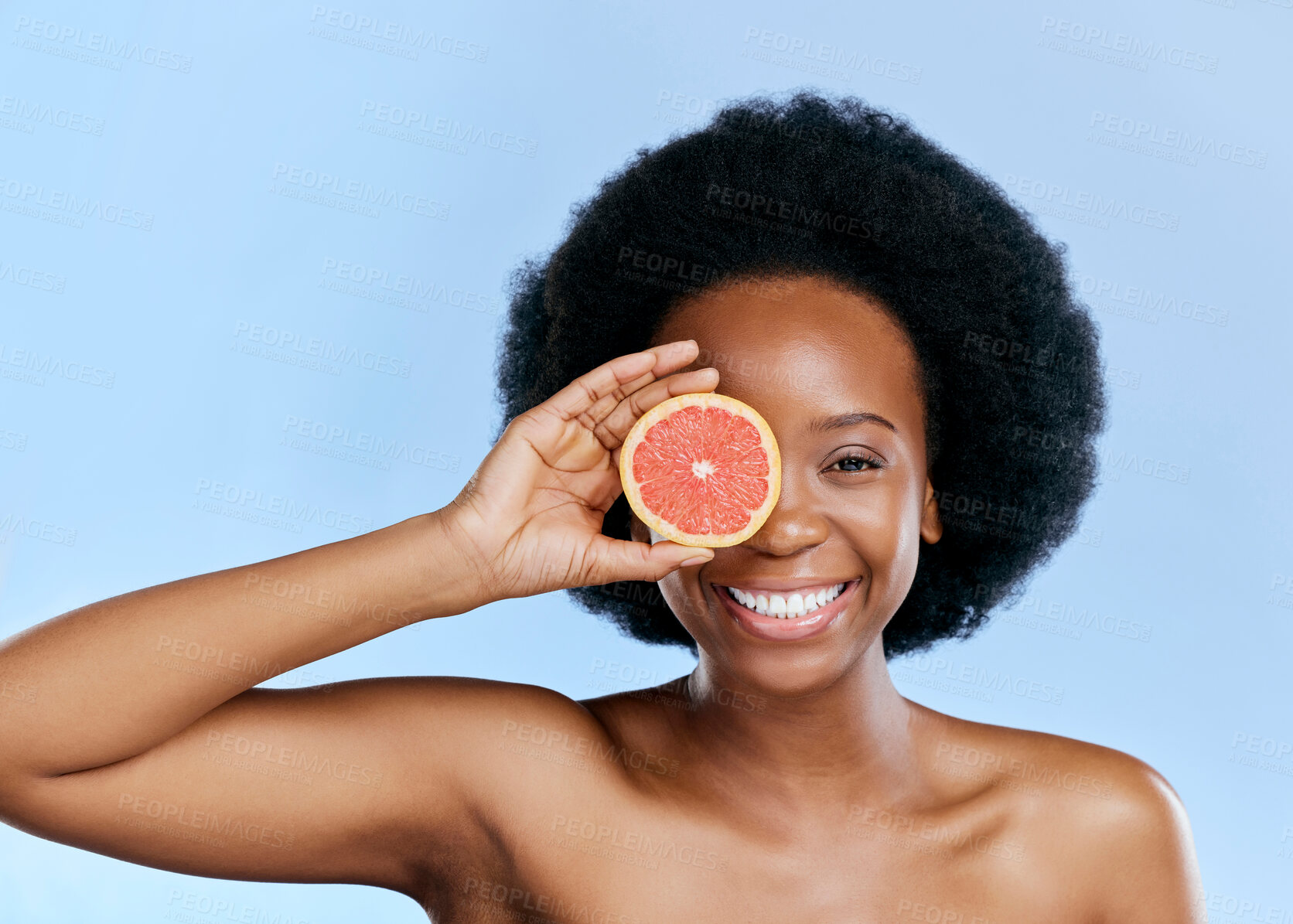 Buy stock photo Black woman, smile in portrait with grapefruit and beauty, natural cosmetic treatment on blue background. Fruit, citrus and vitamin c, eco friendly skincare and happy female model with sustainability