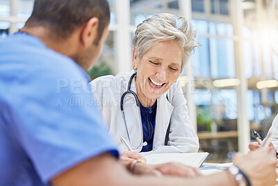 Buy stock photo Meeting, laughing and doctors or people talking and planning for hospital, healthcare or clinic management. Schedule, writing and medical nurse, happy mentor or woman with internship documents