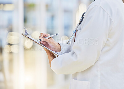 Buy stock photo Hands, person or doctor writing on clipboard, documents or administration of healthcare schedule. Closeup of medical worker, pen or report of insurance checklist, contract or paper script in hospital