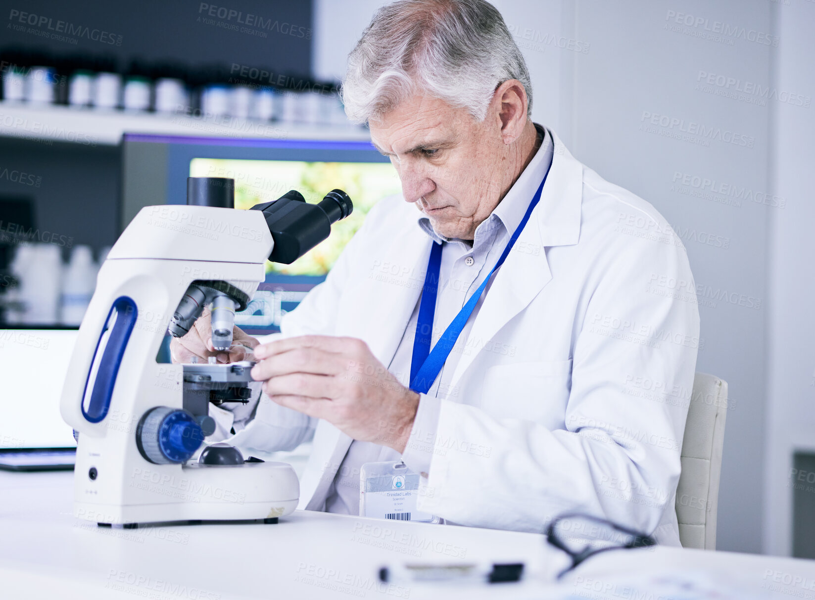 Buy stock photo Mature scientist, man and microscope, review and analysis for science study, medical research and biotechnology in lab. Male person, doctor and pathology, check test sample with scientific experiment