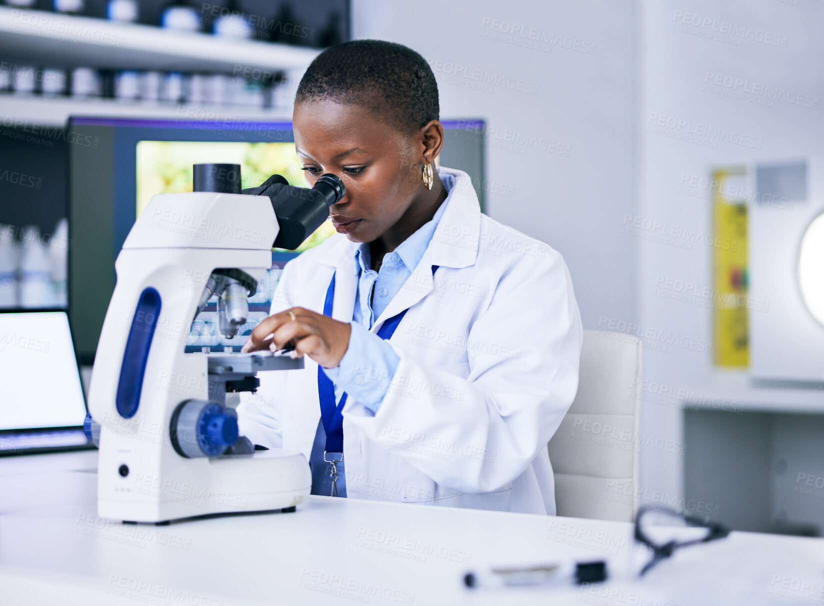 Buy stock photo Scientist, black woman and microscope, analysis and science study with medical research and biotechnology in lab. Female person, doctor and pathology, check test sample with scientific experiment