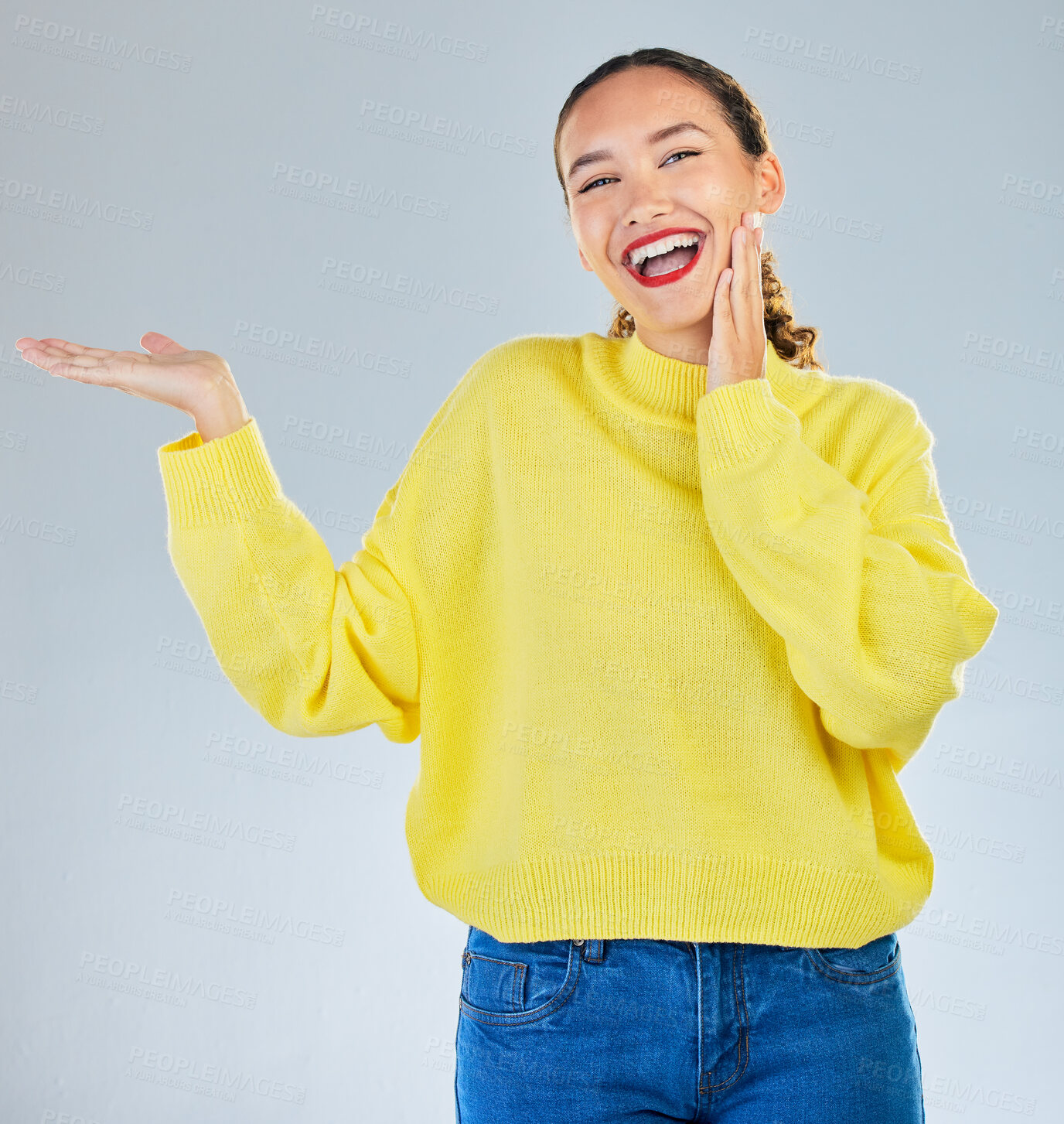 Buy stock photo Space, smile and presentation with portrait of woman in studio for show, advertising and idea. Announcement, promotion and deal with person on grey background for opportunity, offer and news