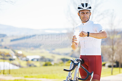 Buy stock photo Cycling, exercise and man with a smart watch, bike and fitness with workout goal, water bottle and monitor progress. Male person, biker or cyclist outside, checking time and online app with training